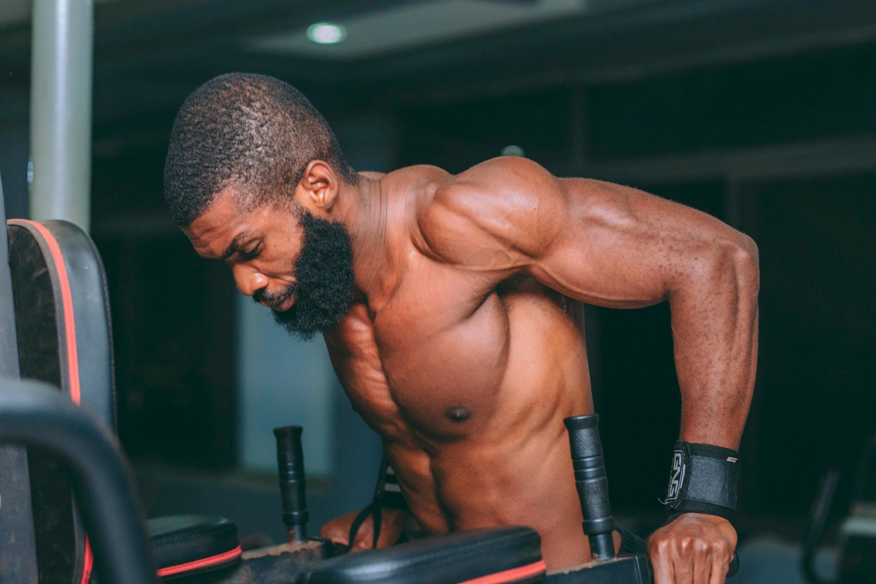 Man lifting weights in a gym